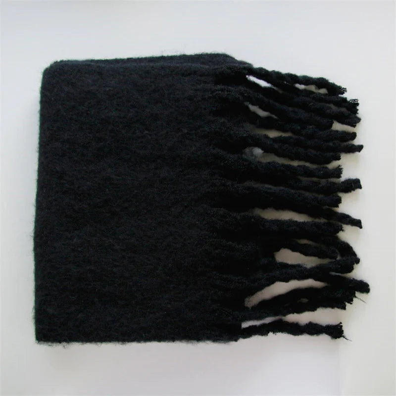 Echarpe en laine épaisse à grandes franges