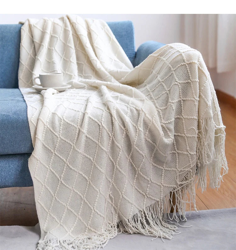 Plaid tricoté à franges