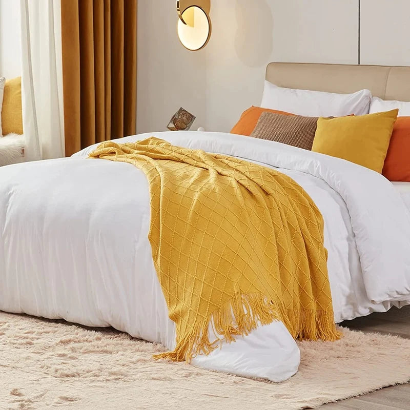 Plaid tricoté à franges